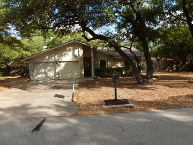 View of front of house with an attached garage, d