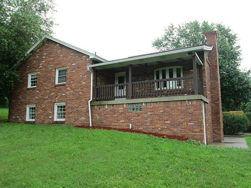 Exterior Front. Brick home sits beautifully on the