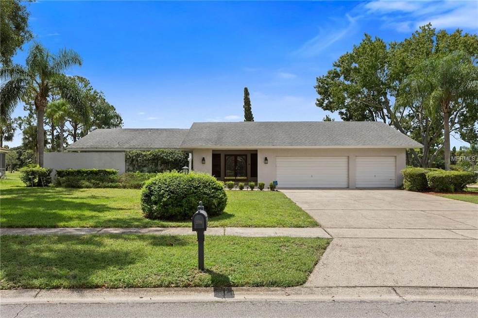 Front exterior - home sits on almost 1/2 acre lot