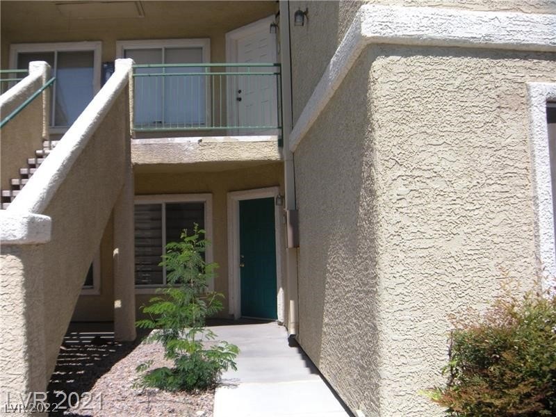 Secluded walk way to front door.  Steps away from