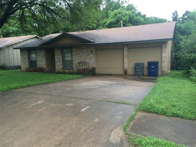 Front of house on a rainy day.