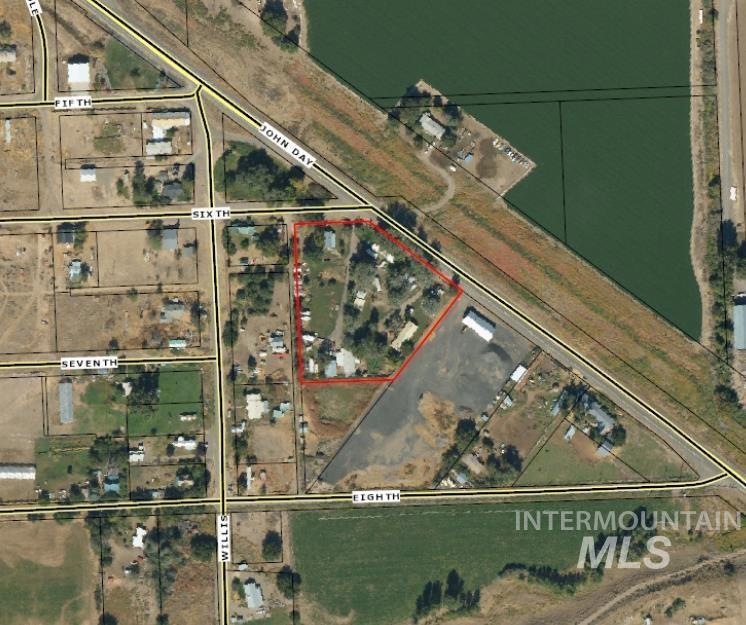 Aerial overview of property's location with property boundaries highlighted
