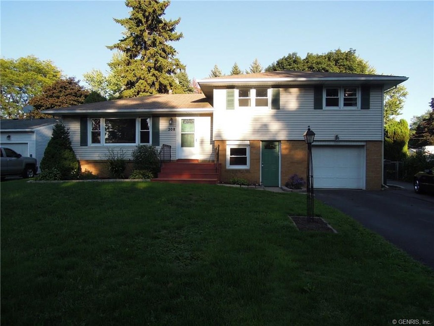 Low maintenance siding, nicely landscaped front ya