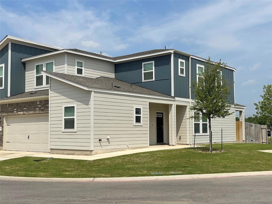 View of front of home with an attached garage and