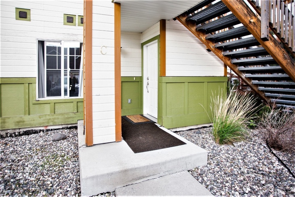 Entry next to garage and reserve parking spot