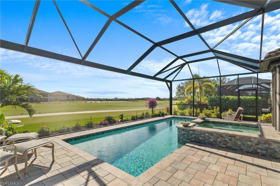 View of swimming pool with a patio, glass enclosur