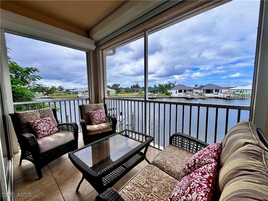 Step out to your screened-in balcony and take in serene waterfront views, where you can unwind and watch boats drift by. The outdoor living space is ideal for morning coffee or evening relaxation surrounded by coastal breezes.