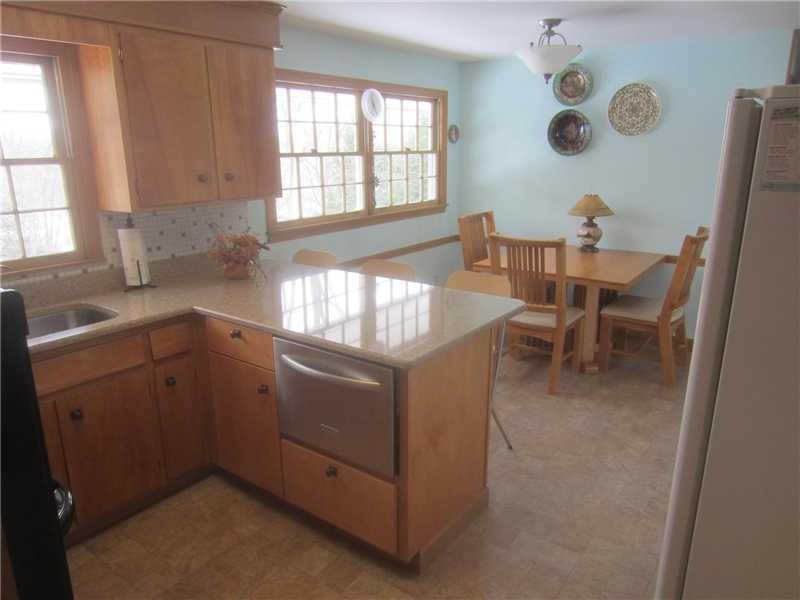 Kitchen. New range top, wall oven, dishwasher and