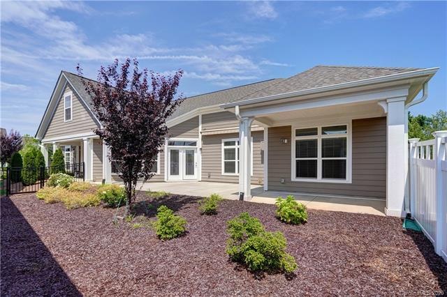 Spacious over sized courtyard with covered porch.