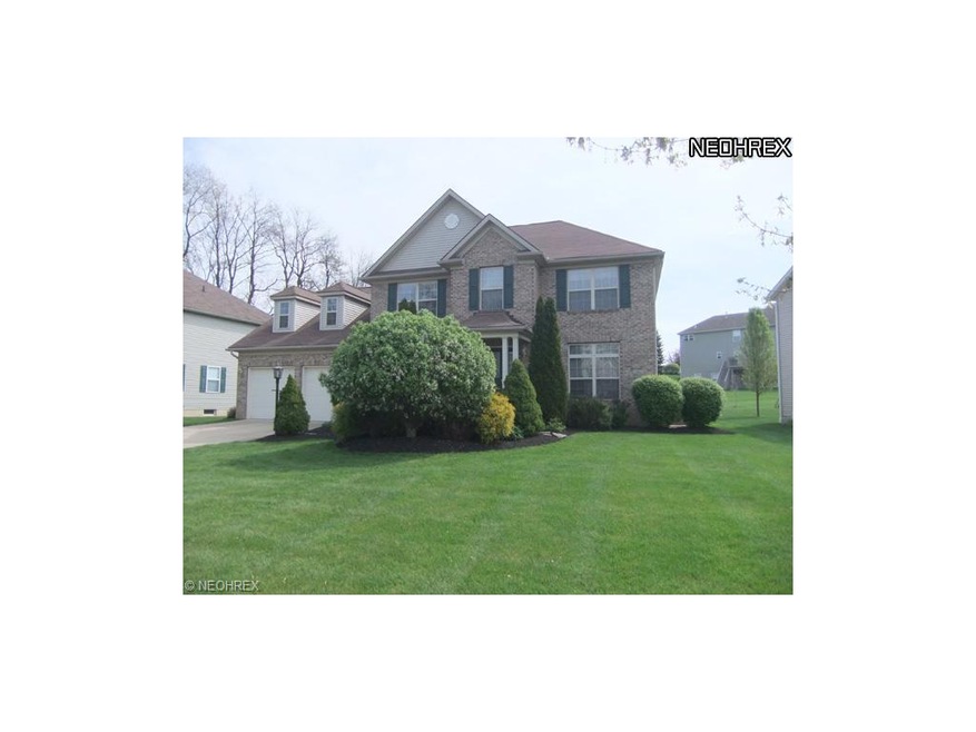 Welcome home to 4559 Litchfield Drive in Copley To