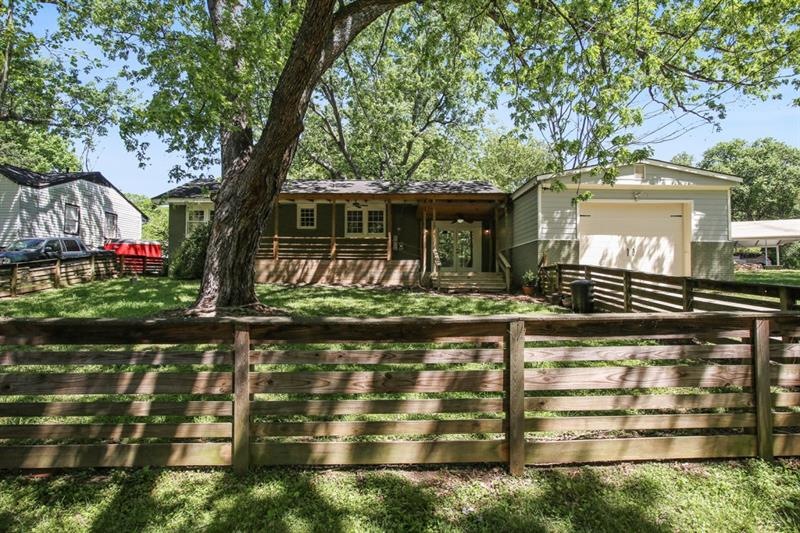 Remodeled Ranch with huge fenced front yard in sou