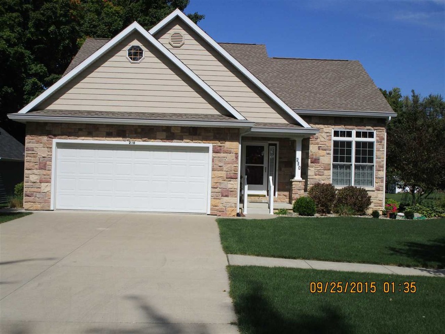 Simply Spacious Living with Custom Built Stone Fro