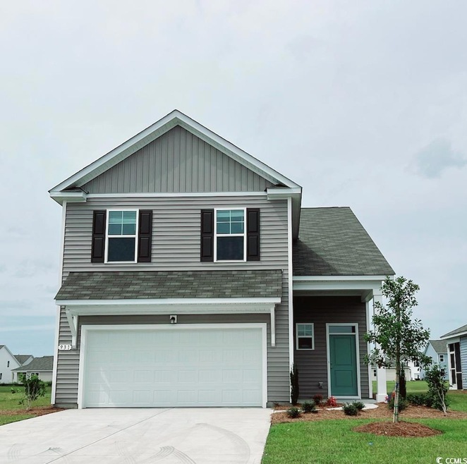 View of front of home with a garage