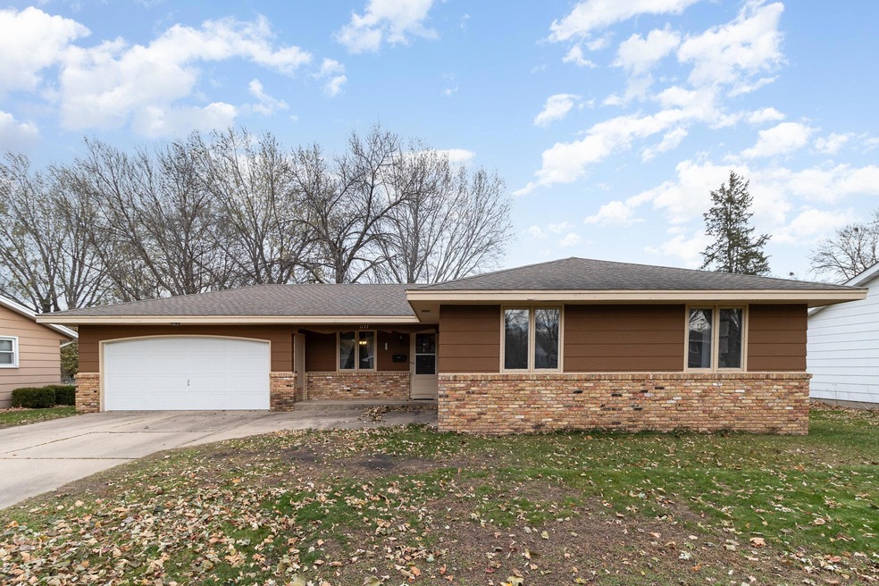 Solid one level  single family home with basement.  Wood with brick accent