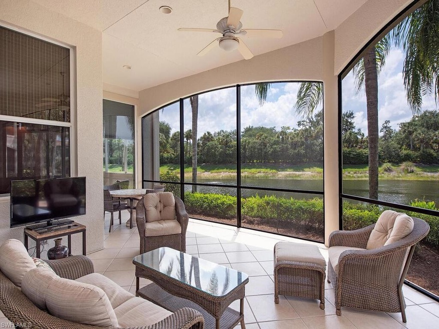 Spacious screened lanai overlooking a serene lake