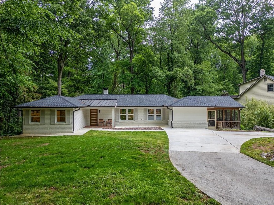 Single story home featuring a front yard