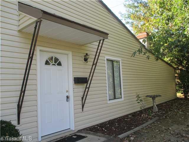 Exterior Front. Private side entry to this 