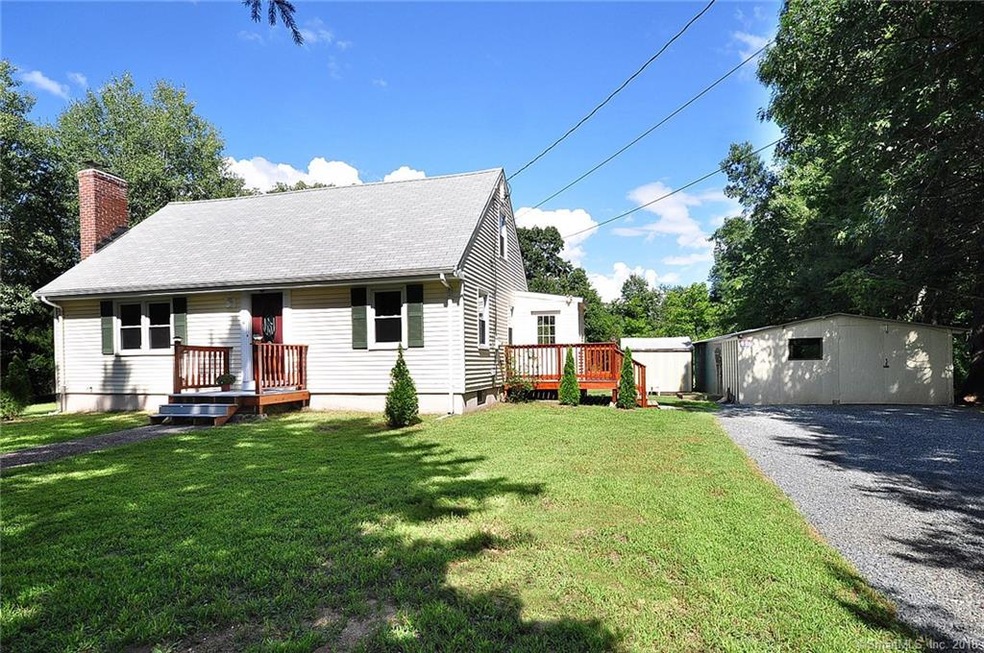 Remodeled cape with open floor plan and large yard