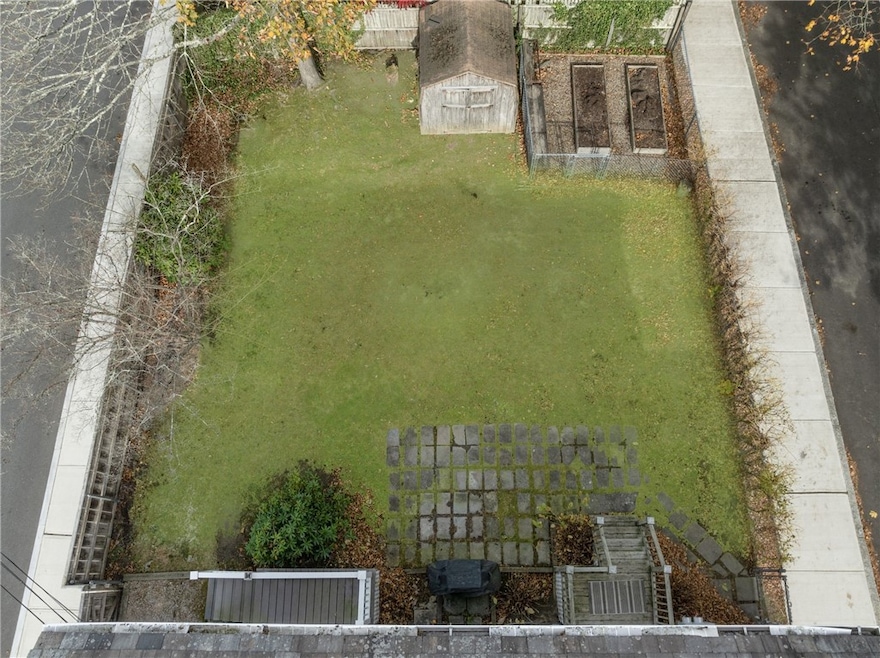 O Meikle Avenue. Vacant lot to be sold with 17 & 19 Meikle Avenue. Grass has been virtually enhanced.