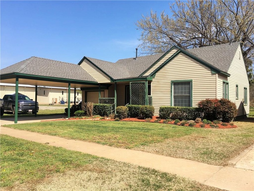 CUTE! CUTE! Bungalow with well manicured lawn