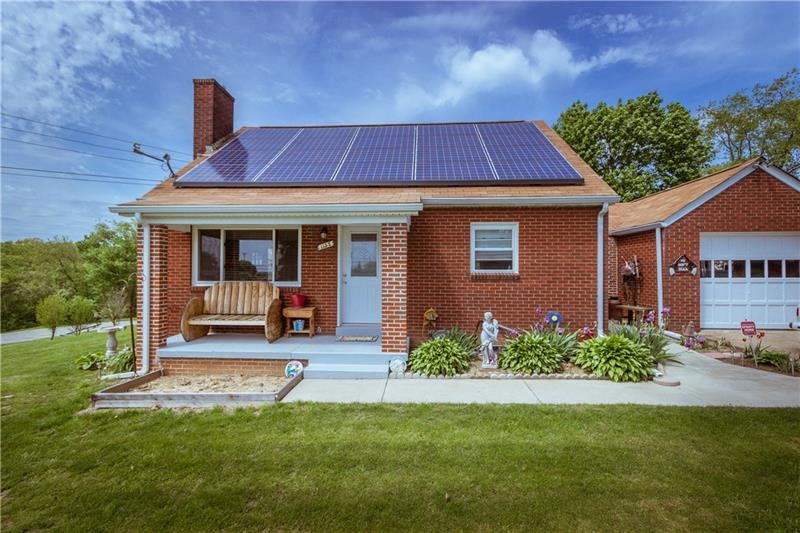 Beautiful brick home  on .40 acres. New sidewalks 