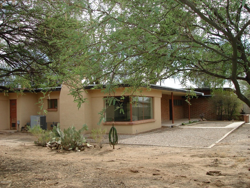 Newly stuccoed east side of home