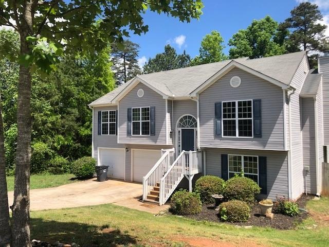Split level ranch with finished basement . Three B
