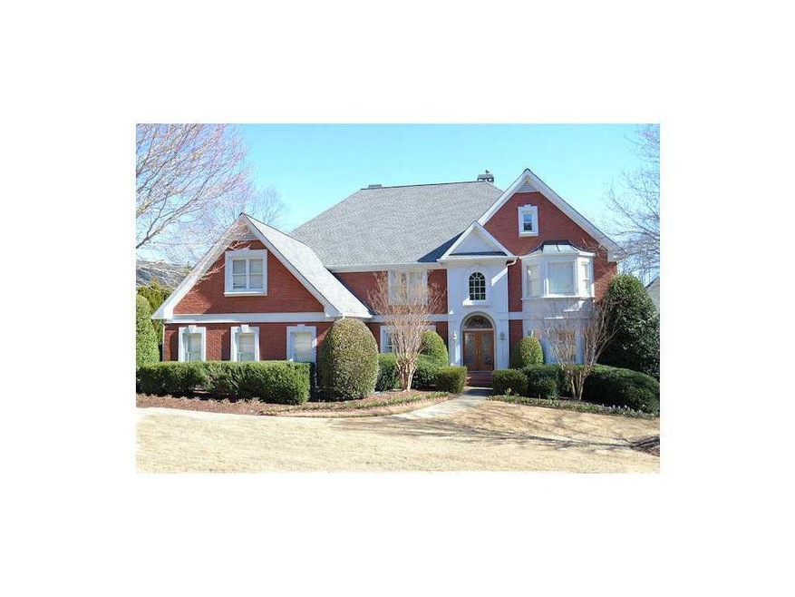 Exterior Front. Updated executive 4 side brick hom