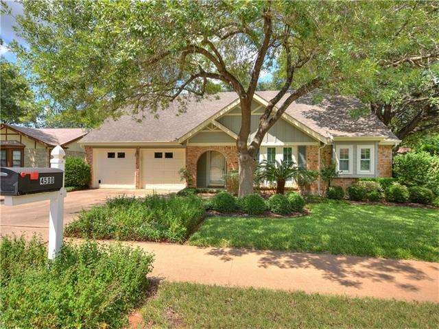 Beautifully updated Northwood home nestled under m