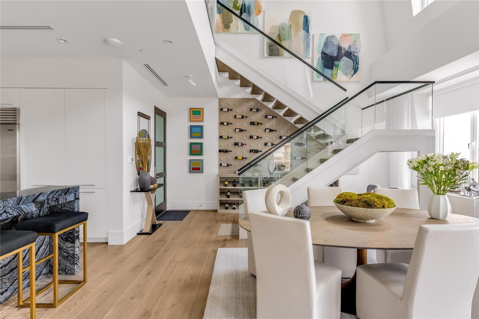 Soaring two-story living and dining.