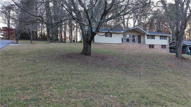 5852 Covered Wagon Trail SW, Lilburn, GA 30047 - photo 1