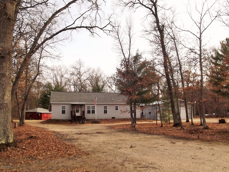 1370 W 17 Mile Rd, Bitely, MI 49309 - photo 1