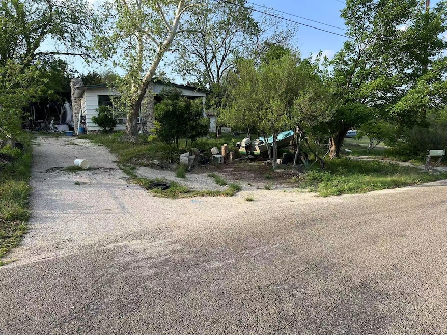 View of road featuring aphalt driveway