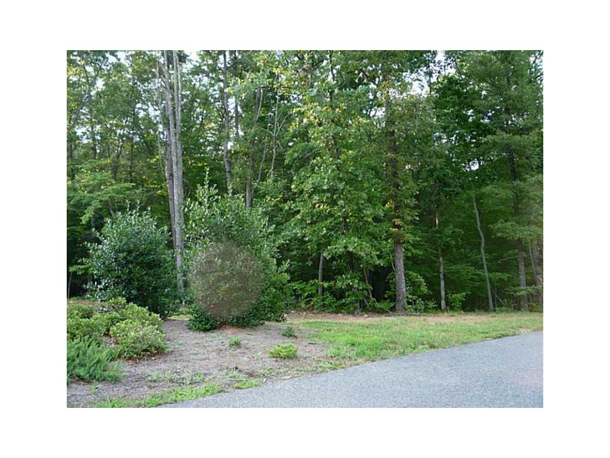 Exterior Front. Heavily wooded lot, 3 acres, level