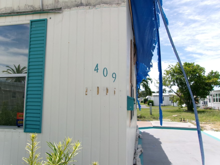 7100 Ulmerton Rd unit Lot 409, Largo, FL 33771 - photo 1