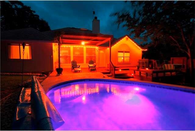 The lighted picture of the pool and house says it 