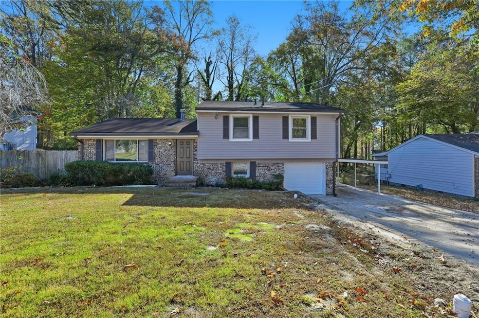 6715 Cedar Hurst Trail, Atlanta, GA 30349 - photo 1