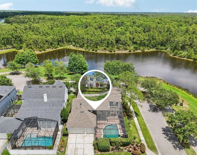 Located one of the most unique and private streets in Avalon Park, this gorgeous David Weekly CUSTOM POOL HOME sits at the end of a quiet CUL-DE-SAC street with only four other homes and unmatched LAKE & CONSERVATION VIEWS!