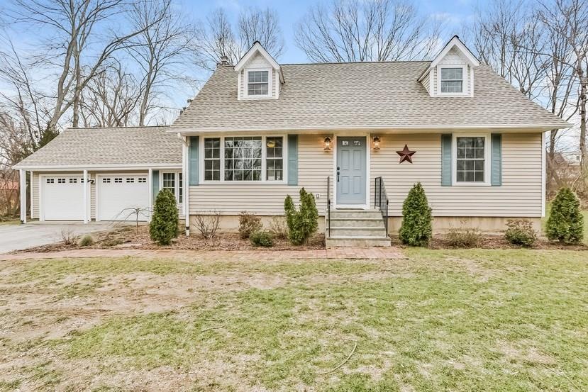 Charming cape with new roof, new windows, efficien