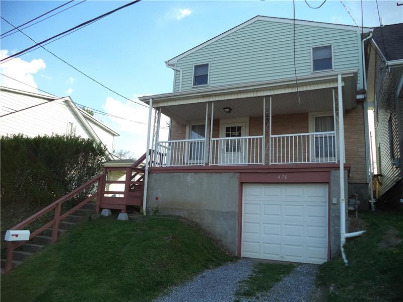 The front of 430 Ocala Street (facing East). 2 car