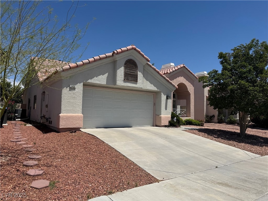 Mediterranean / spanish home with driveway, an att