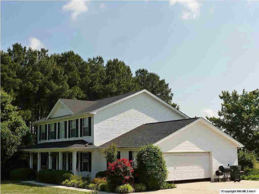 This 2970 SqFt House features 4 Bedrooms, 3 baths. Sits on 4.9 Acres.