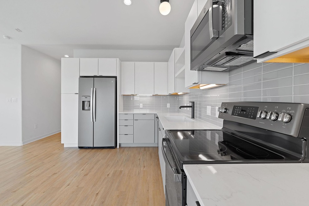 Kitchen featuring appliances with stainless steel