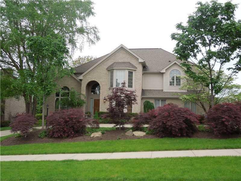 Exterior Front. Custom Minton Built home located o