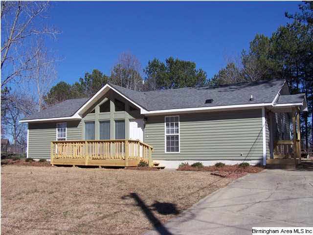 Front view of house, new siding, new roof, new win