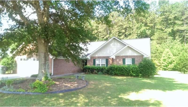Beautiful four sides step-less brick ranch in the 
