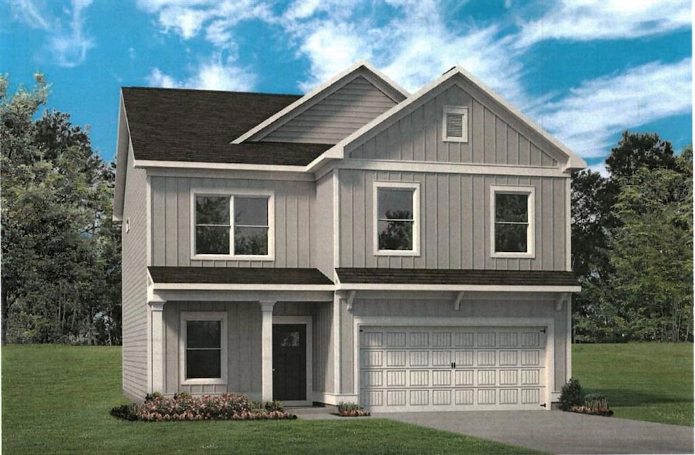 View of front of house featuring a garage and a fr