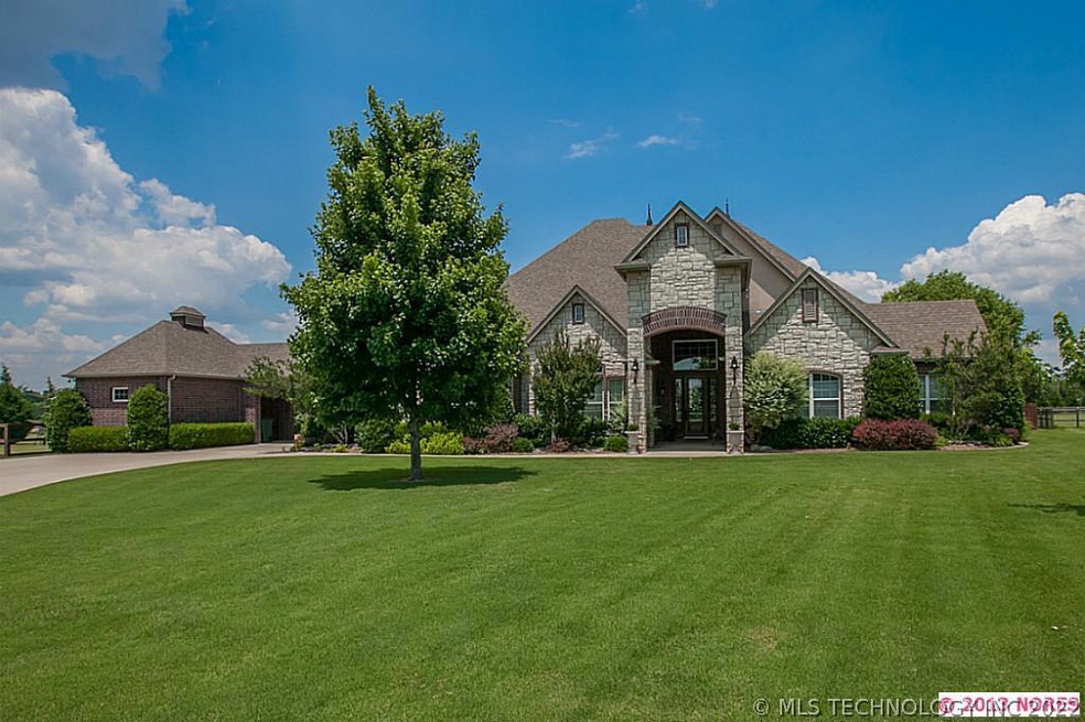Custom built home on 1.43 acres with private 15 zo