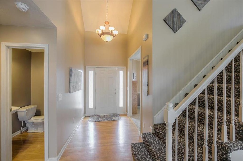 1514 Cove Dr, Raymore, MO 64083 - photo 1