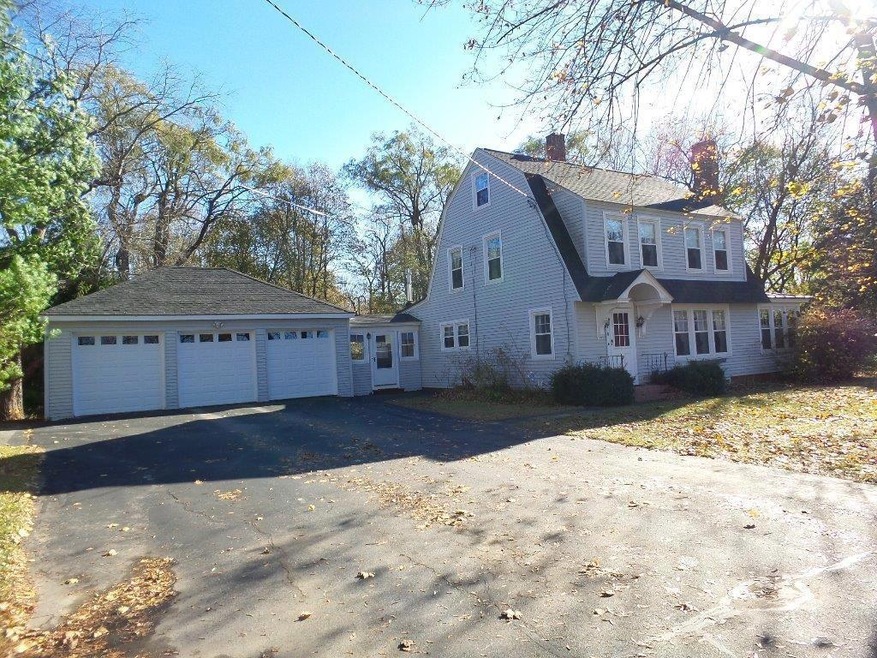 Dutch Colonial with 3 car attached...